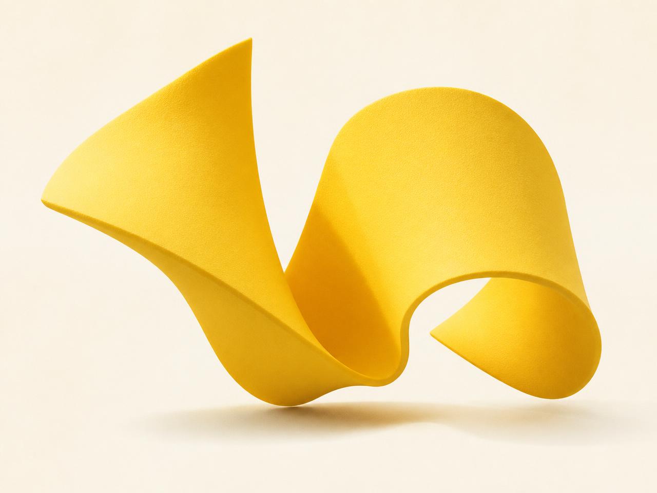 Sculptural yellow ribbon form